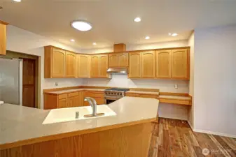 This delightful kitchen offers plenty of cabinet space!