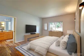 Virtually Staged primary bedroom is light & bright!