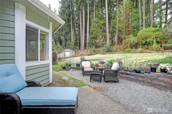 Nice patio area in back yard offers a beautiful space to enjoy the garden & territorial views!