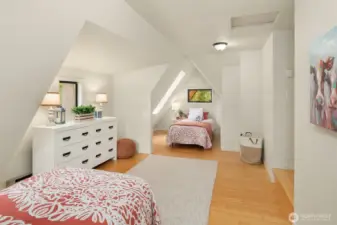 Large Bonus Room with dormered ceiling and skylight