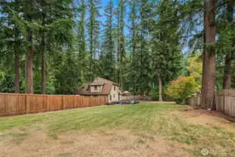 Fully usable, level and fenced back yard.