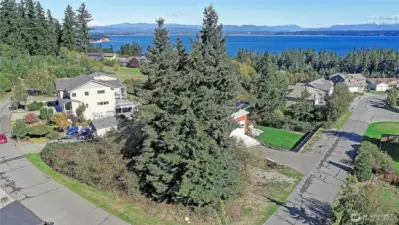Prime corner lot at West Thunder Rd and Rolling Dr a beautiful parcel in a quiet Camano Island neighborhood.