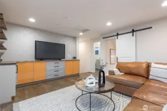 Custom built in cabinets, TV ready, additional bonus room with barn door for added privacy.