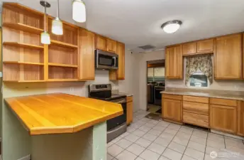 Shiny & Bright Kitchen looking to the Laundry Room & Back Entrance