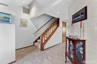 Entryway and view of the stairs going to upper level.