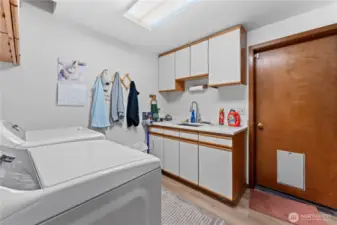 Utility Room - sink and counter top have been upgraded recently.