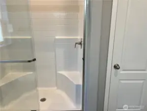 Primary bathroom with walk in shower.