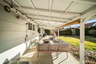 Relax under the covered patio that spans the length of the home