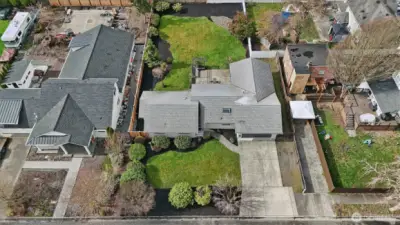 Turn-key perfection on nearly a third of an acre! This beautifully updated 1,706 sq. ft. rambler offers the ultimate in single-level living. Fresh interior and exterior paint sets a crisp, modern tone, complemented by brand-new carpet in the Great Room, bonus space, and primary suite. The heart of the home is a sun-drenched kitchen with a skylight, garden window, and solid oak cabinetry, flowing seamlessly into the open Great Room. Retreat to the primary suite featuring a private slider to the backyard, or enjoy the refreshed main bath with its new tile shower and vanity backsplash.    The exterior is an absolute showstopper: professionally landscaped grounds with a large hardscape patio, wood trellis, and a secondary stone patio for fire-pit nights. With a freshly cleaned roof and gutters, brand-new washer/dryer, and a fully-fenced backyard with western exposure, this home is truly move-in ready. Welcome home!