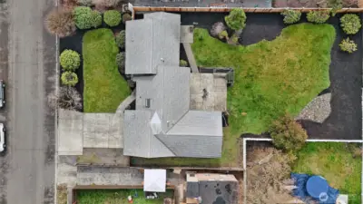 Nearly 1/3 acre lot creates a home with privacy and park-like front and backyards.