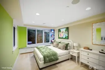 One of two bedrooms in the Childrens Wing with coffered ceiling. Built-in dresser in closet and oversized window seat with ample storage below is always appreciated.
