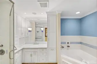 Separate Childrens full bathroom with heated flooring.Canyon Creek cabinets with crown molding. One of a kind Canadian blue marble counters. Tambour door storage area.