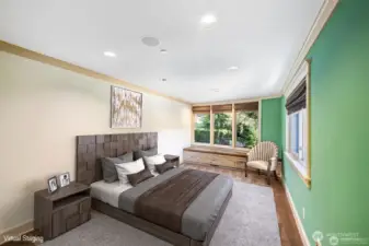 Another bedroom in the Childrens Wing with built-in dresser in closet. Window seat with ample storage below is always appreciated.