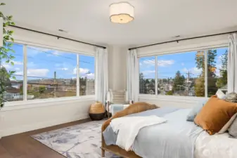 Primary bedroom with views.