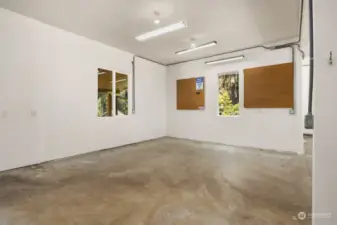 The 1,246 sf garage has a large workshop area. The garage has three bays and also has air filtration.