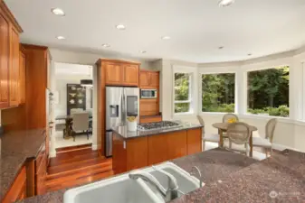 View from the breakfast counter across the kitchen to the dining room.