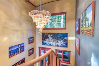 Ascending the staircase, you'll notice craftsman made ballastrod, maple treads and risers.