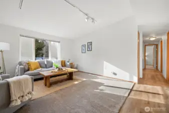 Large window in second living room floods the space with natural light.