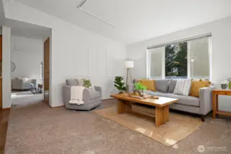 View of the second living room. NEW carpet & fresh interior paint. Vaulted ceilings.