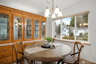 Lovely dining room with plenty of storage.