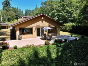 Large back concrete patio to enjoy overlooking the river