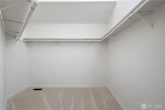 Oversized primary closet with plenty of space for your customization!