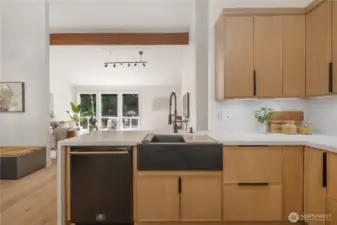 Apron sink with work ledge and accessories.