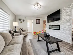 Fireplace and open flow to kitchen