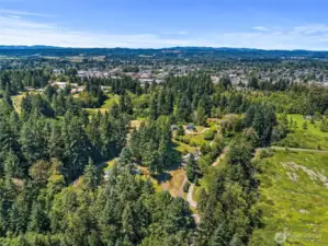 Surrounded by nature, this property offers a quiet, rural escape with room to breathe and relax, but minutes to town.