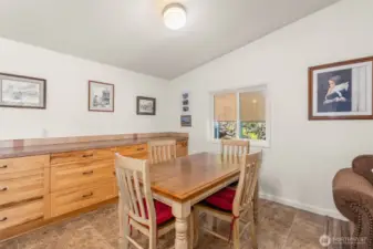 Thoughtfully placed oversized drawers in the dining room provide functional storage and keep your kitchen organized and efficient.