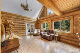 French doors lead you to the wrap around deck.