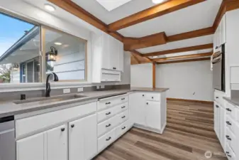 Remodeled Kitchen . Views of deck.