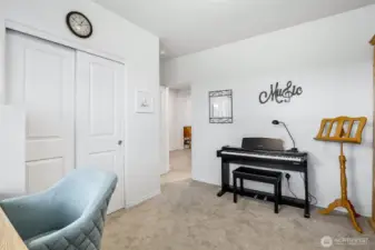Enter the piano studio with your musical instruments or use it as a bedroom or den.