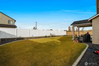 The backyard reminds me of a graduation party I went to not long ago.  It's so nice for yourself and guests when you have a covered and lit-up area to have your morning coffee.