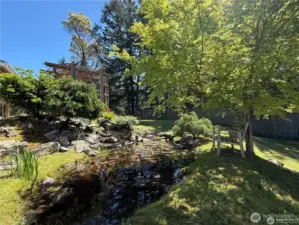 The sound of the water adds a calming ambiance to the outdoor setting.