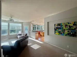 A tranquil color palette throughout the home and massive picture windows brings a sense of peace and a light airiness to the homes interior.