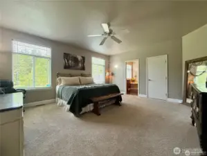 Grand primary bedroom is spacious and sunny. Plenty of room for even the largest bedroom furnishings.