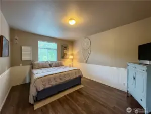 Bonus room is located off the living room and could also serve as a large office space or studio.