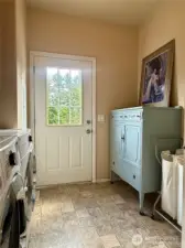 Laundry room with access to yet a third deck!