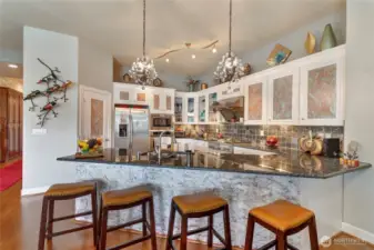 Peninsula Island seats 4 comfortably, great room facing sink means you're always part of the action!