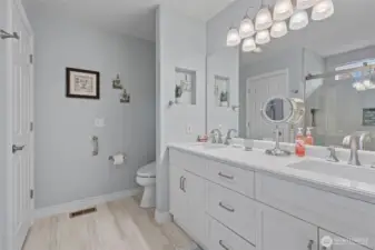 Updated flooring, vanity and countertops.