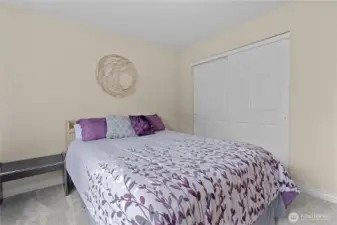 Second bedroom, even the closet doors have been painted!