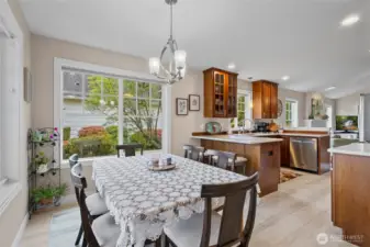 Dining moves easily into the beautiful kitchen area