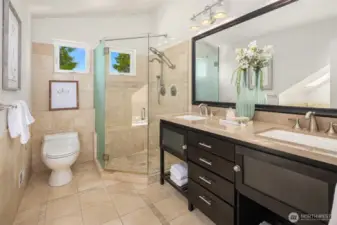 Ensuite bath includes a dual vanity and double head shower