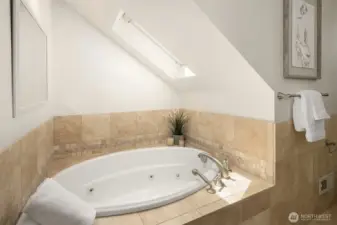 Enjoy a relaxing bubble bath in your jacuzzi tub