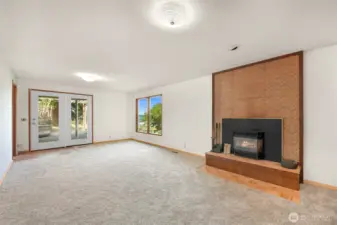 Separate entry leading to lower level patio.