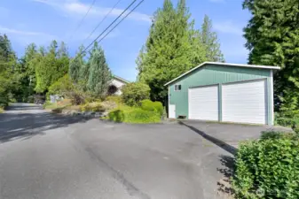 Check out this amazing shop/garage! Plenty of space for whatever you can think of. Located just down the hill off of the primary bedroom patio.