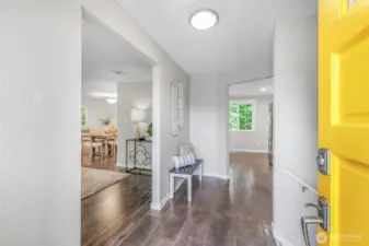 Step inside to a bright foyer with tile flooring and open sightlines into the main living areas. The thoughtful layout makes the home feel inviting right from the entry.