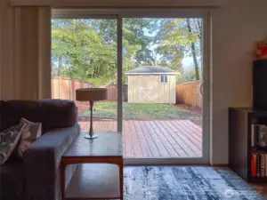 Unit B- Living Room with access to fully fenced private backyard