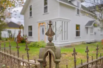 The original wrought iron gate and fence is still in great condition.